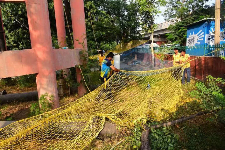 Protesters scale water tank to seek SI exam cancellation