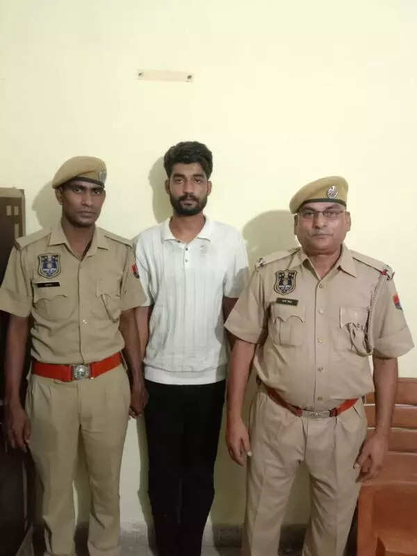 Key member of extortion gang held in city after firing incident