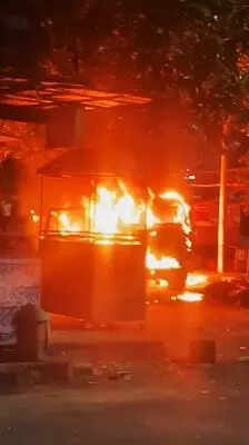 Locals set SUV on fire after it hits biker, divider