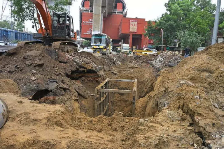 Rain impedes, increases work of repairing roads